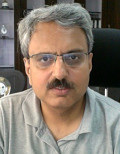 Dr. Huzur Saran